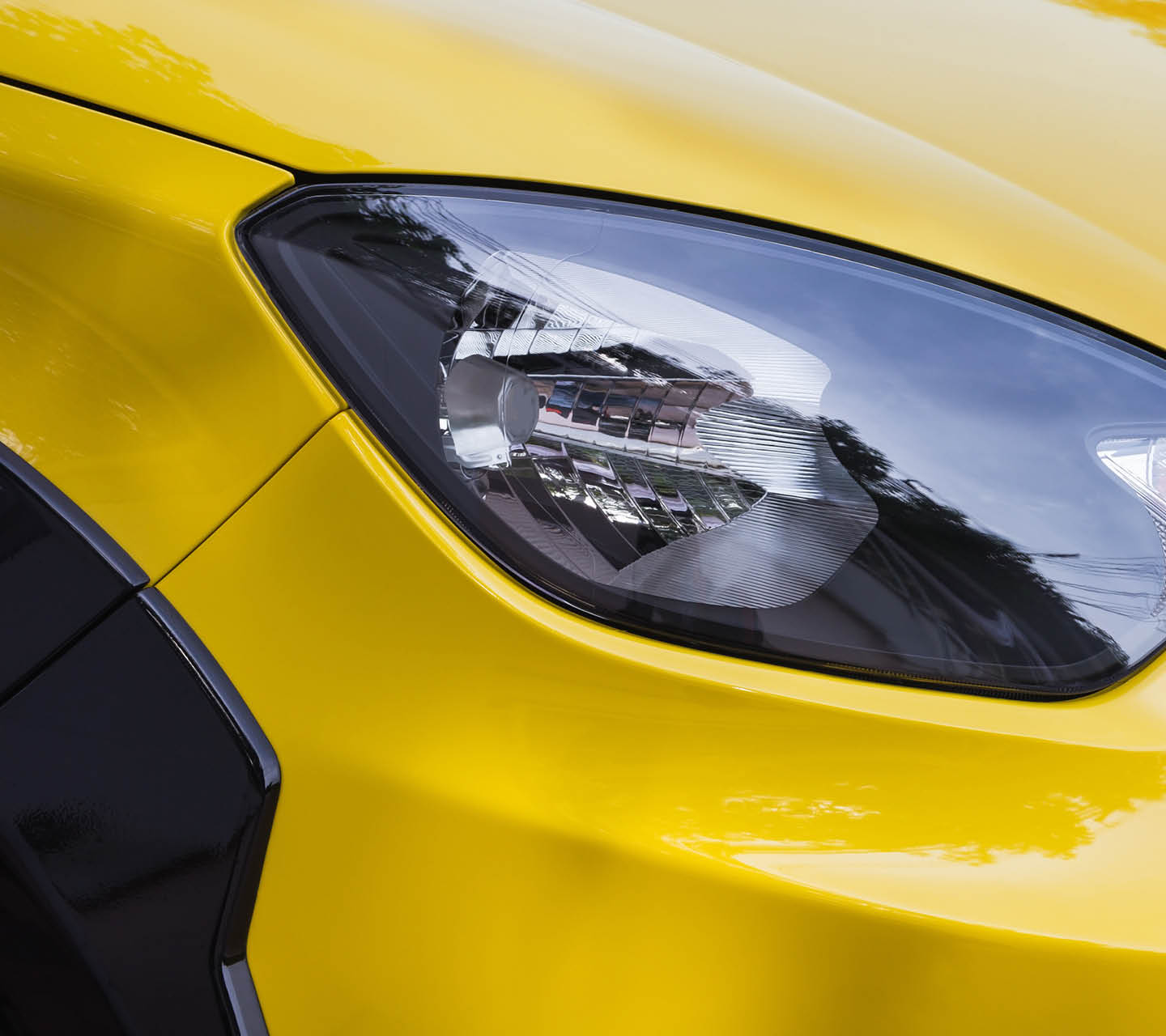 Closeup point on Headlight lamp car.